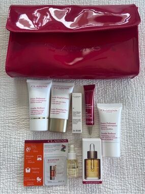 Clarins NWT Travel Sizes Skincare Set with Red Cosmetic Pouch Face Eyes Lips